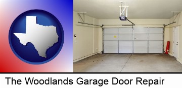 a garage door interior, showing an electric garage door opener in The Woodlands, TX